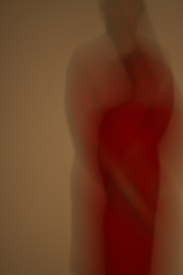 lady in red abstract photography blurred